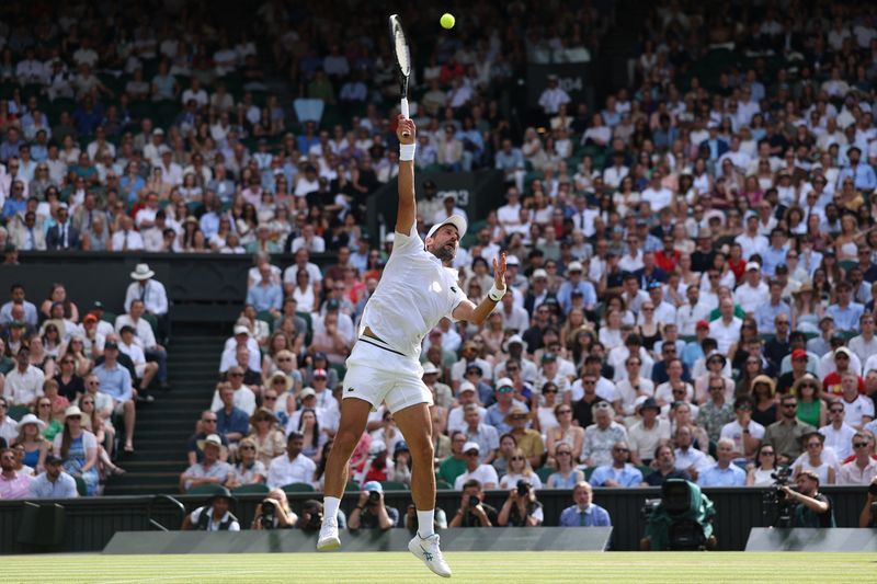 Djokovic surpasses Federer's Wimbledon record with quarter-final victory