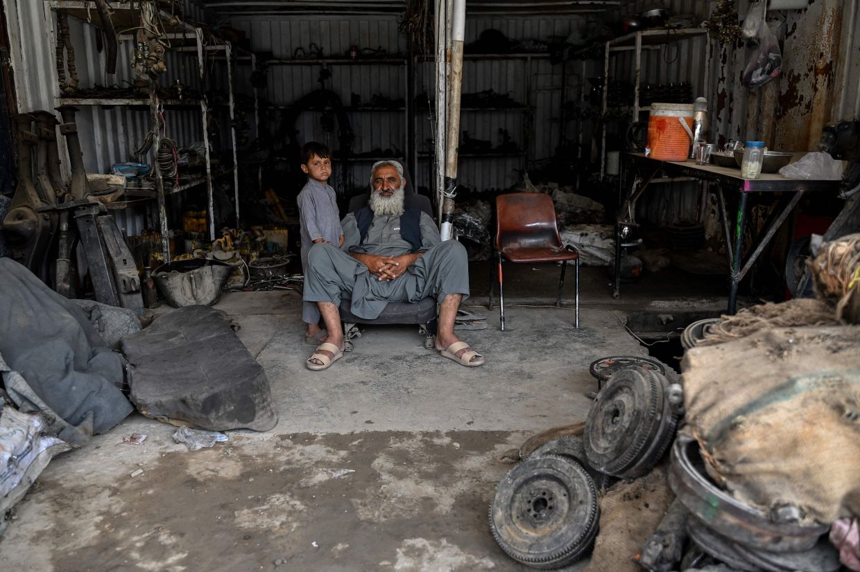 Afghanistan's car trade grinds to halt as regional conflicts choke supply lines