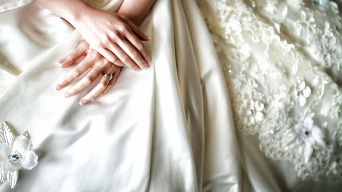 The Emotional Weight of Letting Go: Why Wedding Dresses Hold Stories We Struggle to Release