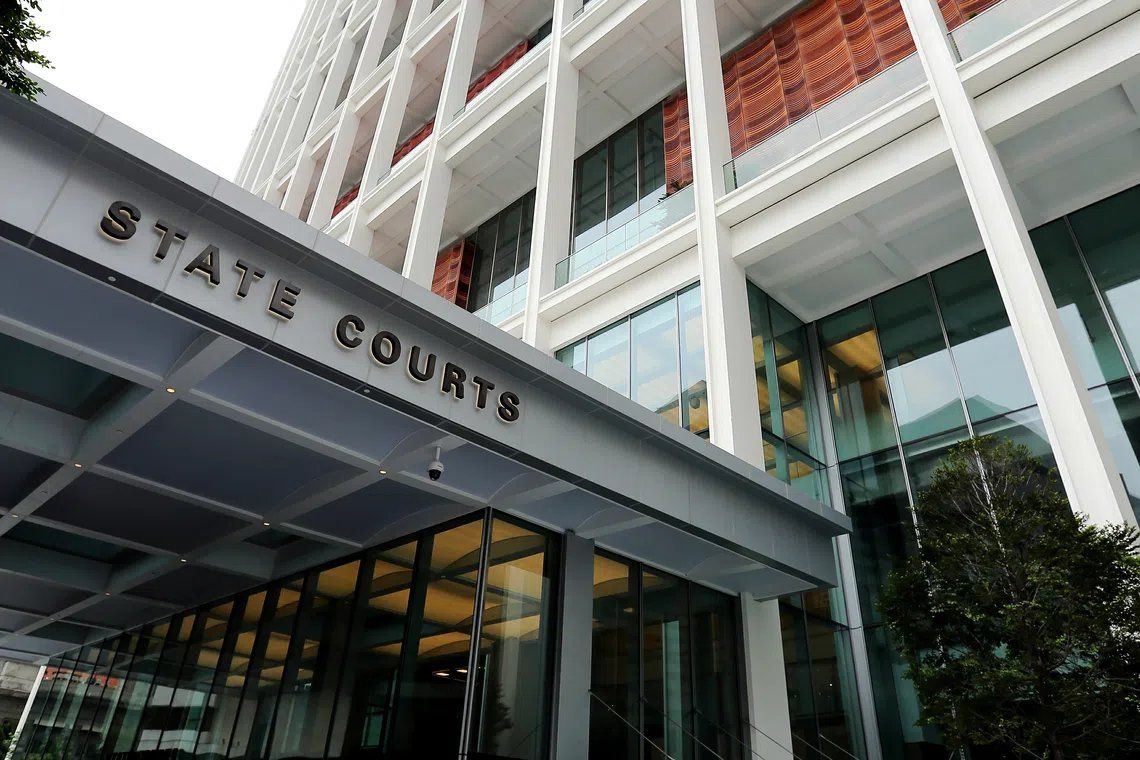 Director charged in S$32 million luxury goods fraud linked to Singaporean couple