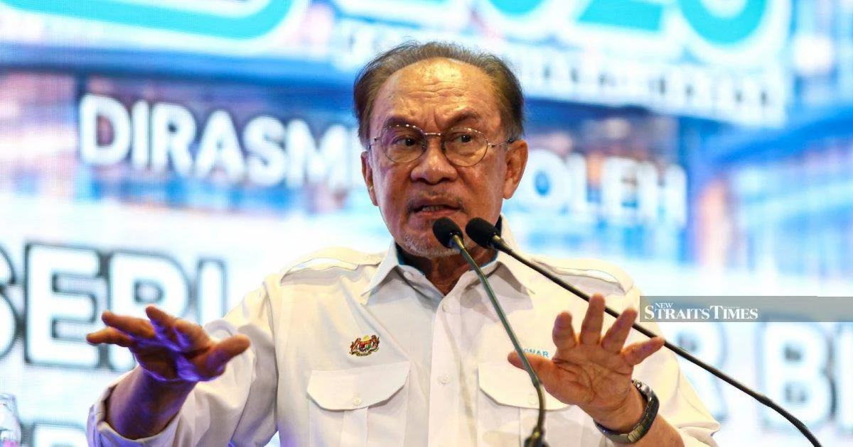 Anwar asks Melaka DAP to delay state government exit, citing development priorities