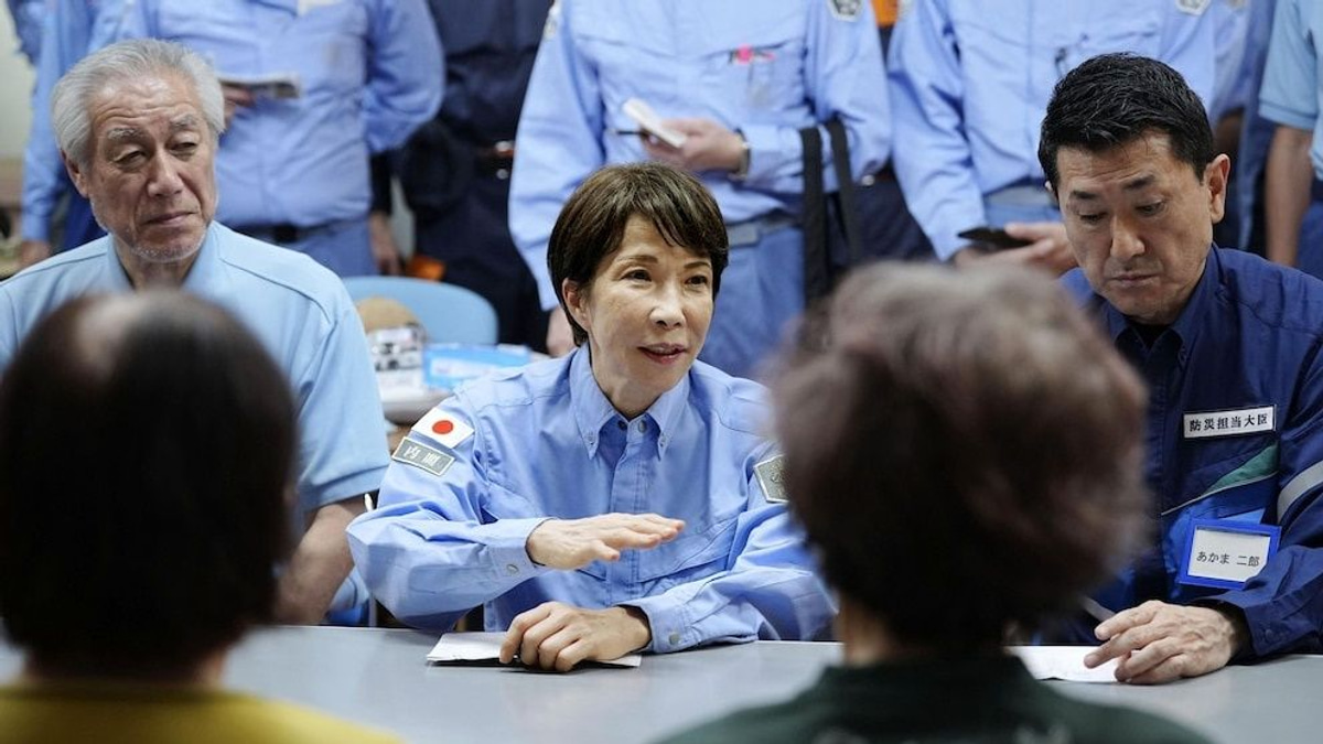 Japan's PM visits quake-devastated Kumamoto as heat and shortages compound disaster recovery crisis