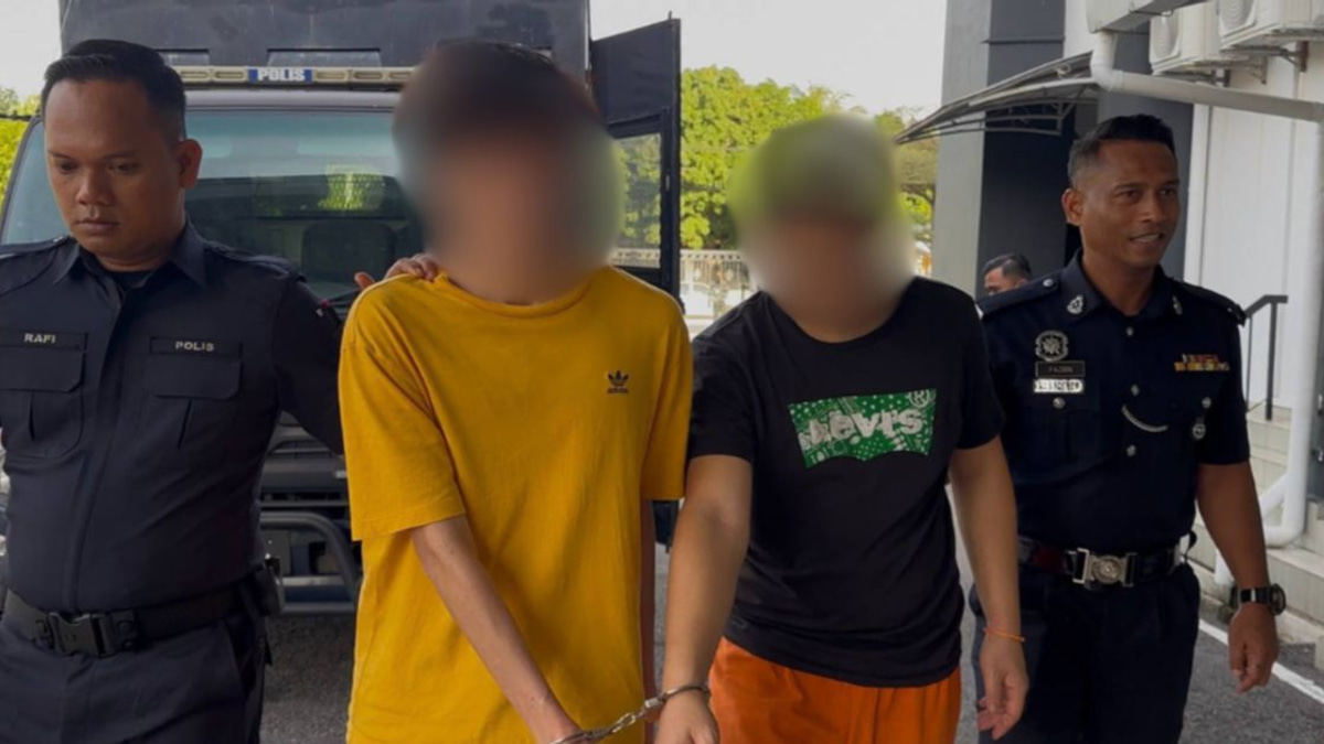 Two arrested in connection with body found wrapped in net in Johor
