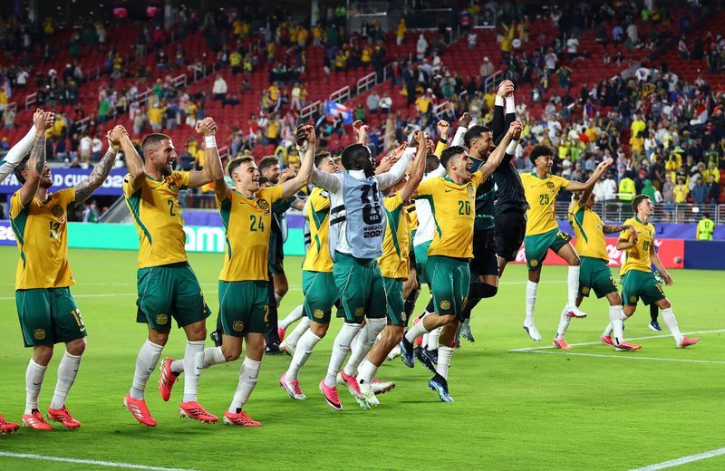 Australia advance to World Cup knockouts after stalemate with Paraguay