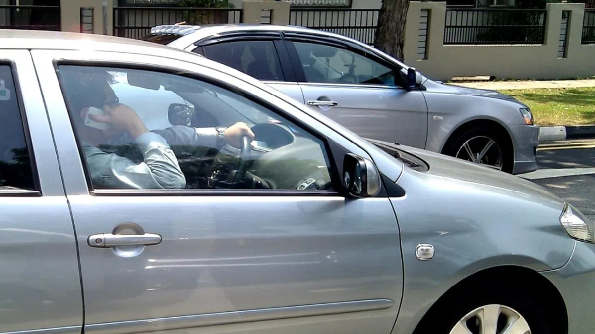 Singapore tightens traffic laws with jail time for holding phones while driving