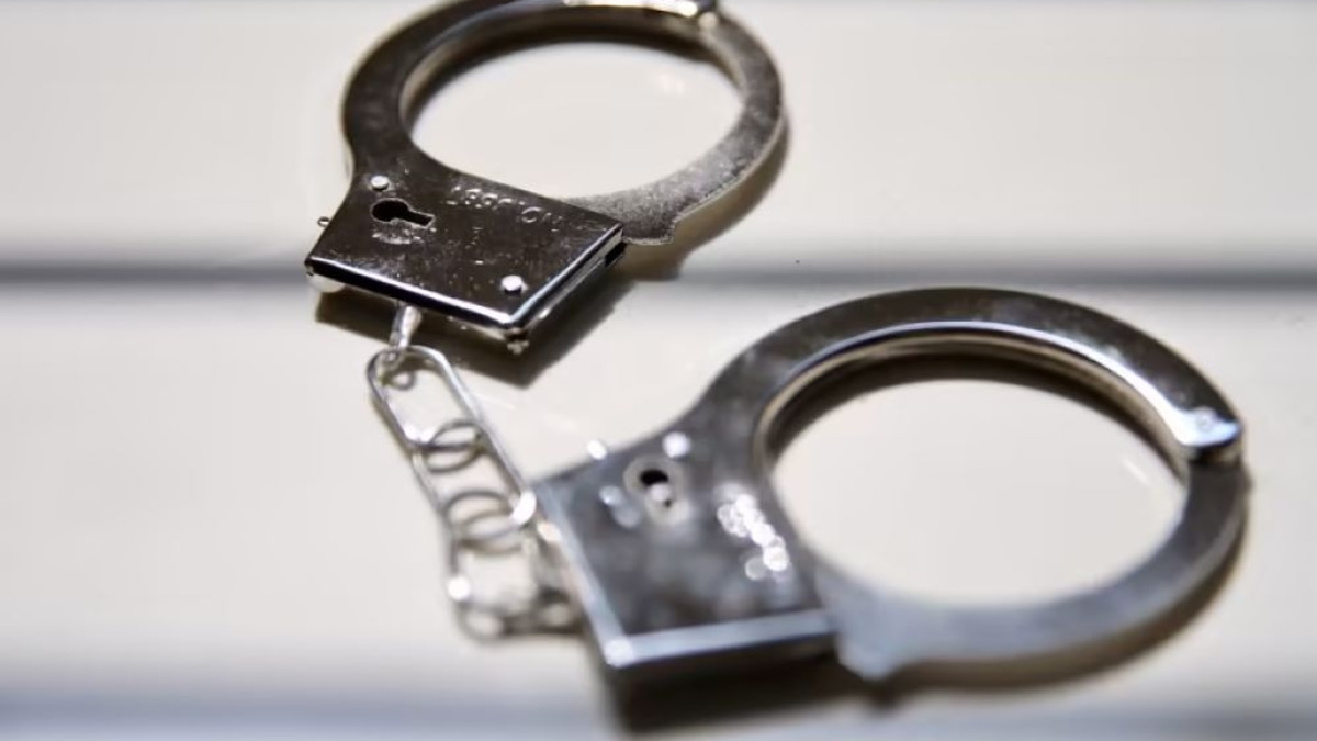 Activist Held for Investigation After Return from Thailand
