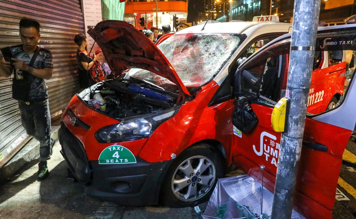 Hong Kong Woman Seeks HK$8.4 Million in Damages After Taxi Hit Her During 2019 Protest