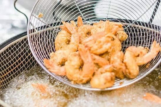 Taiwan prosecutors charge 15 people and four firms in tainted cooking oil scandal