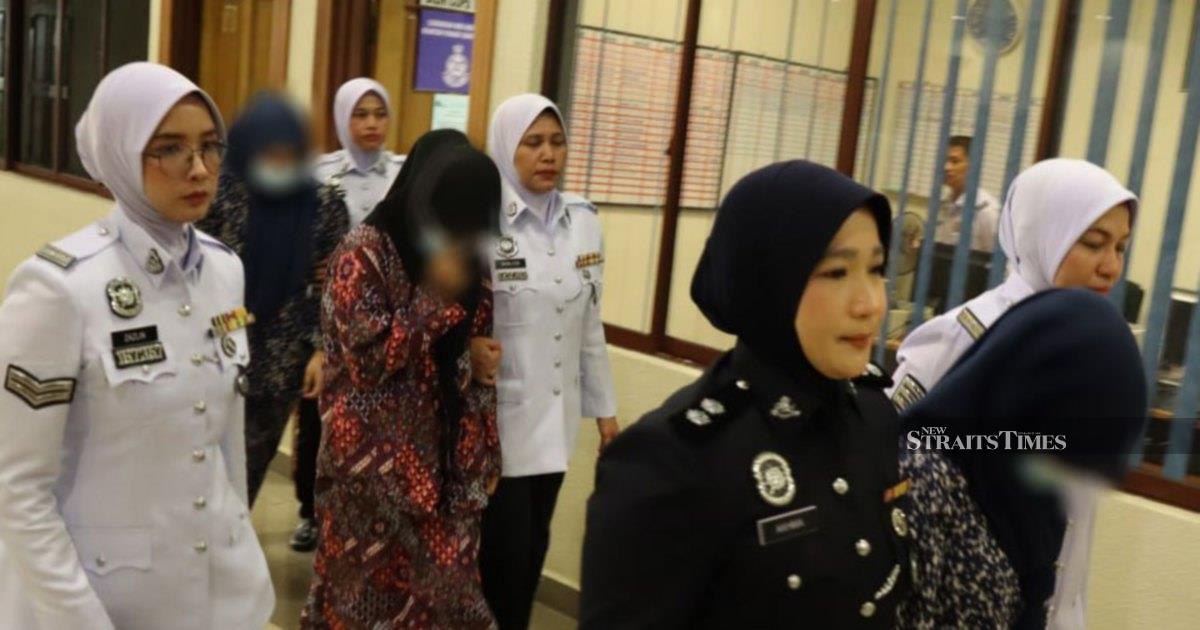 Three women charged for viral 'Superman' motorcycle stunt in Kuantan